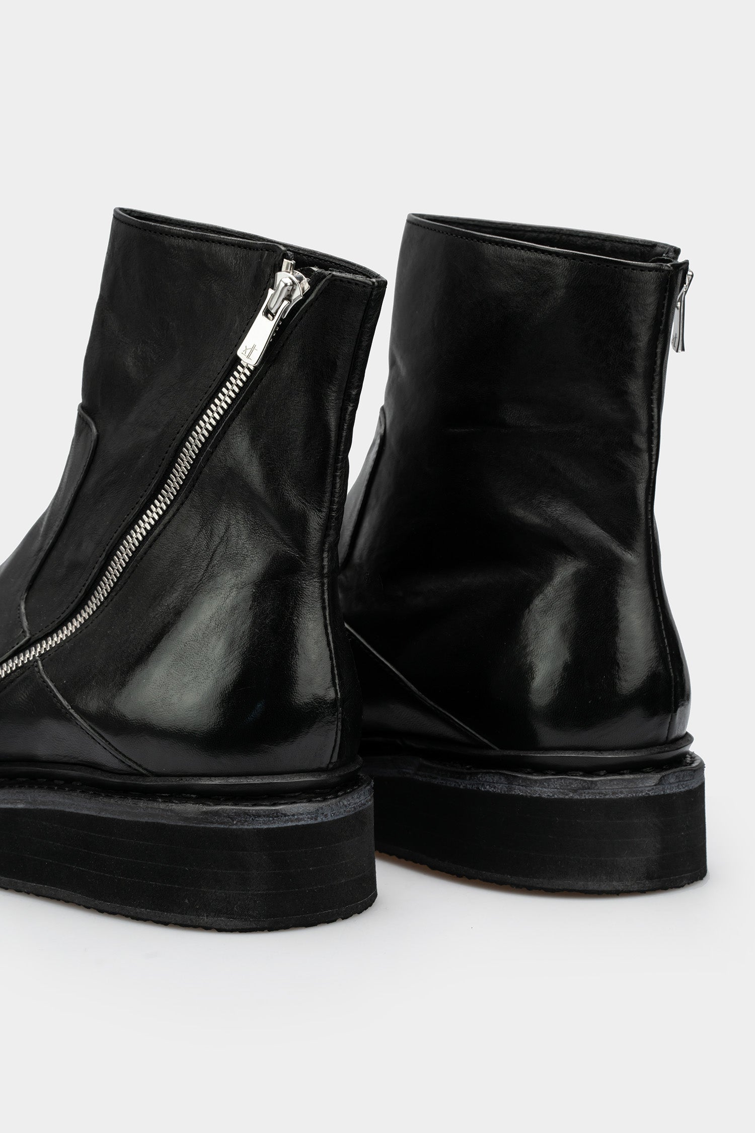 Asymmetrical zip creeper boots